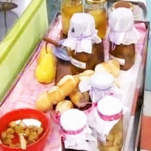 Peras al vino blanco y batatas en almíbar