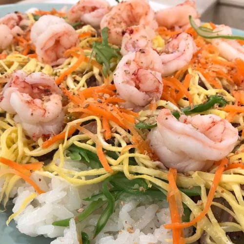 Sushi familiar en fuente y cazuela de peceto y arroz