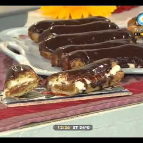 Tentadores eclaires de crema y bañado en chocolate