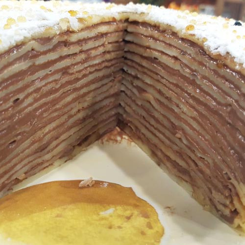 Torta de panqueques con crema pastelera de chocolate