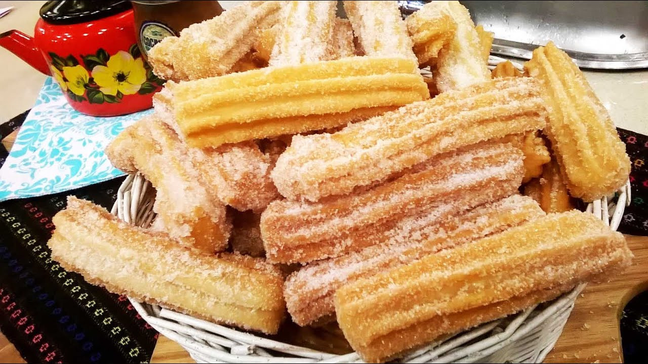 Churros rellenos de dulce de leche para la merienda - Cocineros Argentinos