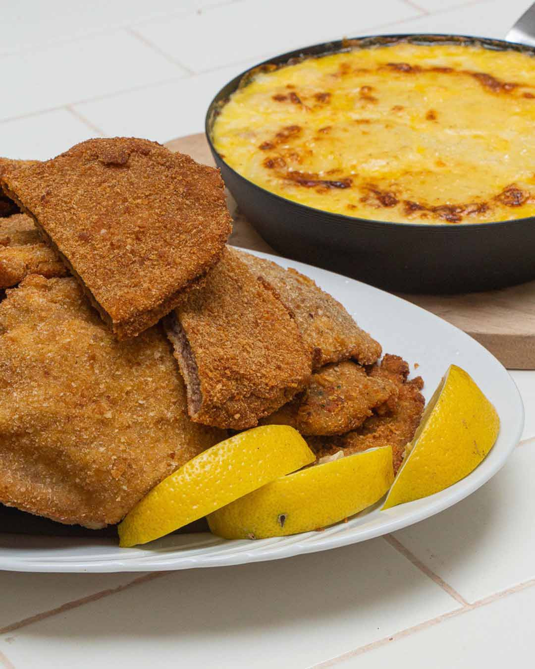 MILANESA DE CARNE CON PAPAS A LA CREMA - Cocineros Argentinos